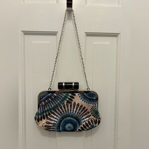 STUNNING CLUTCH BAG WITH VIBRANT BLUE AND BLACK PATTERN AND CHUNKY BLACK CLASP